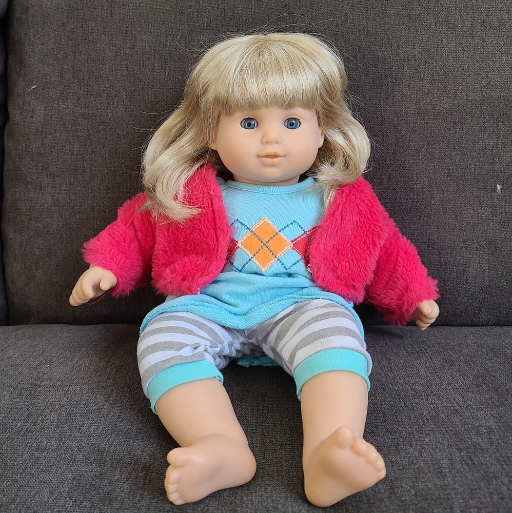 American Girl doll with outfit